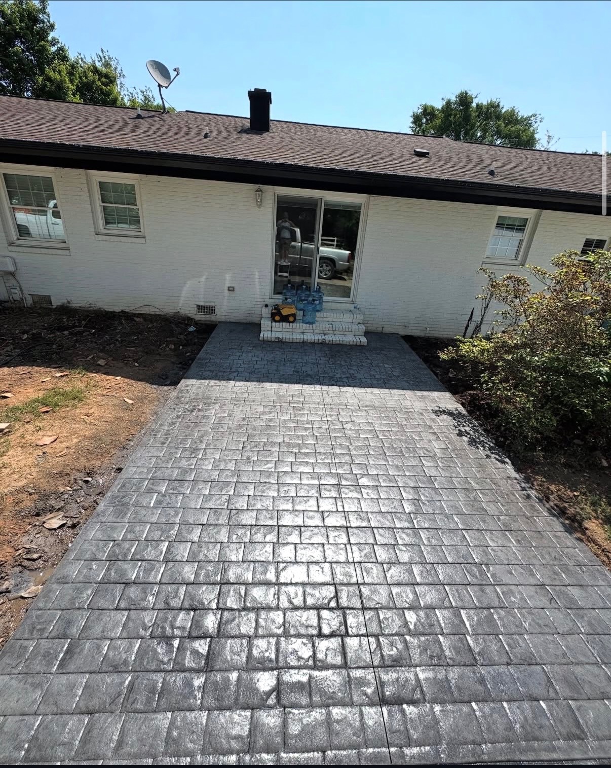 Decorative concrete patio by Southern Surfaces LLC